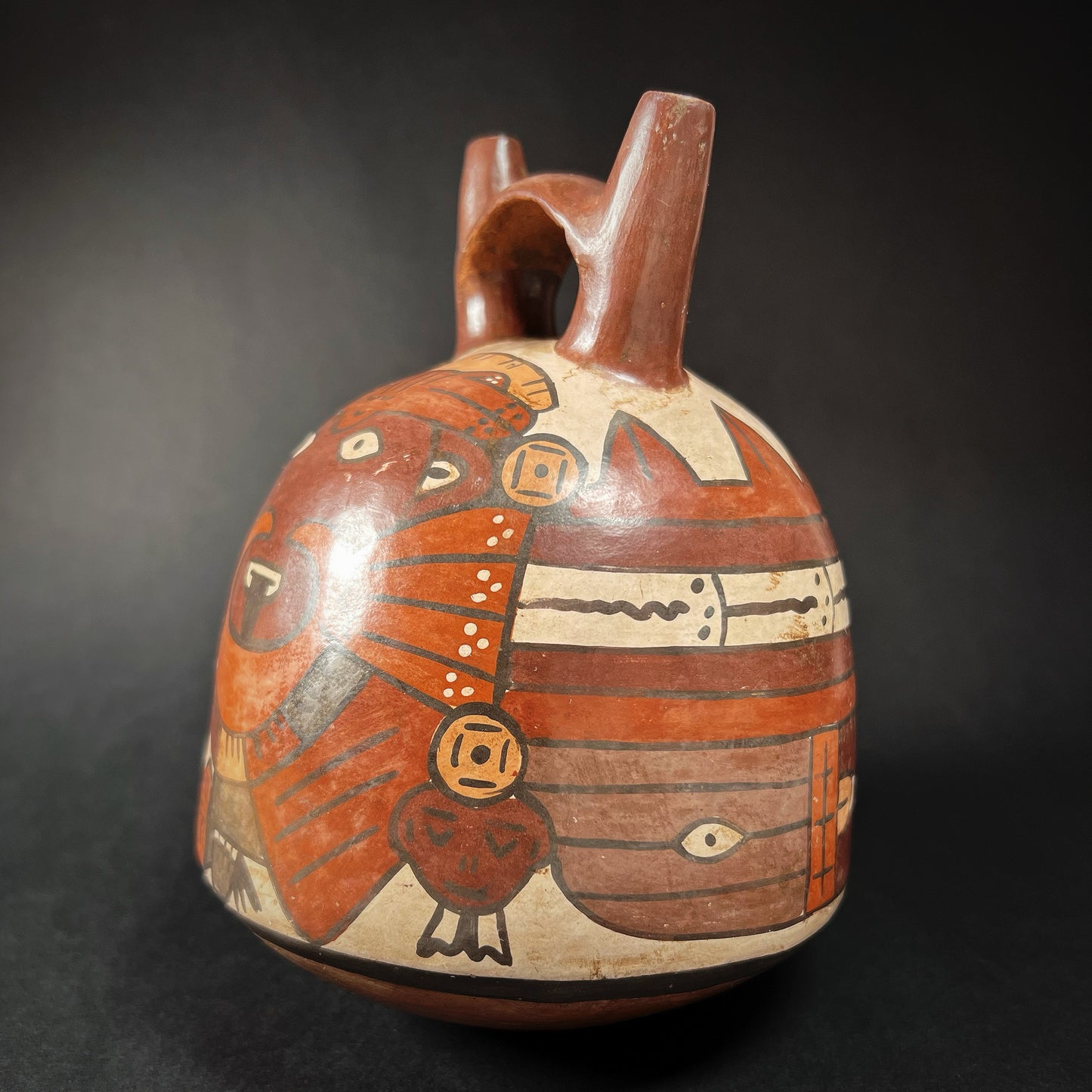 Nazca Stirrup-Spout Bottle with Costumed Ritual Performer
