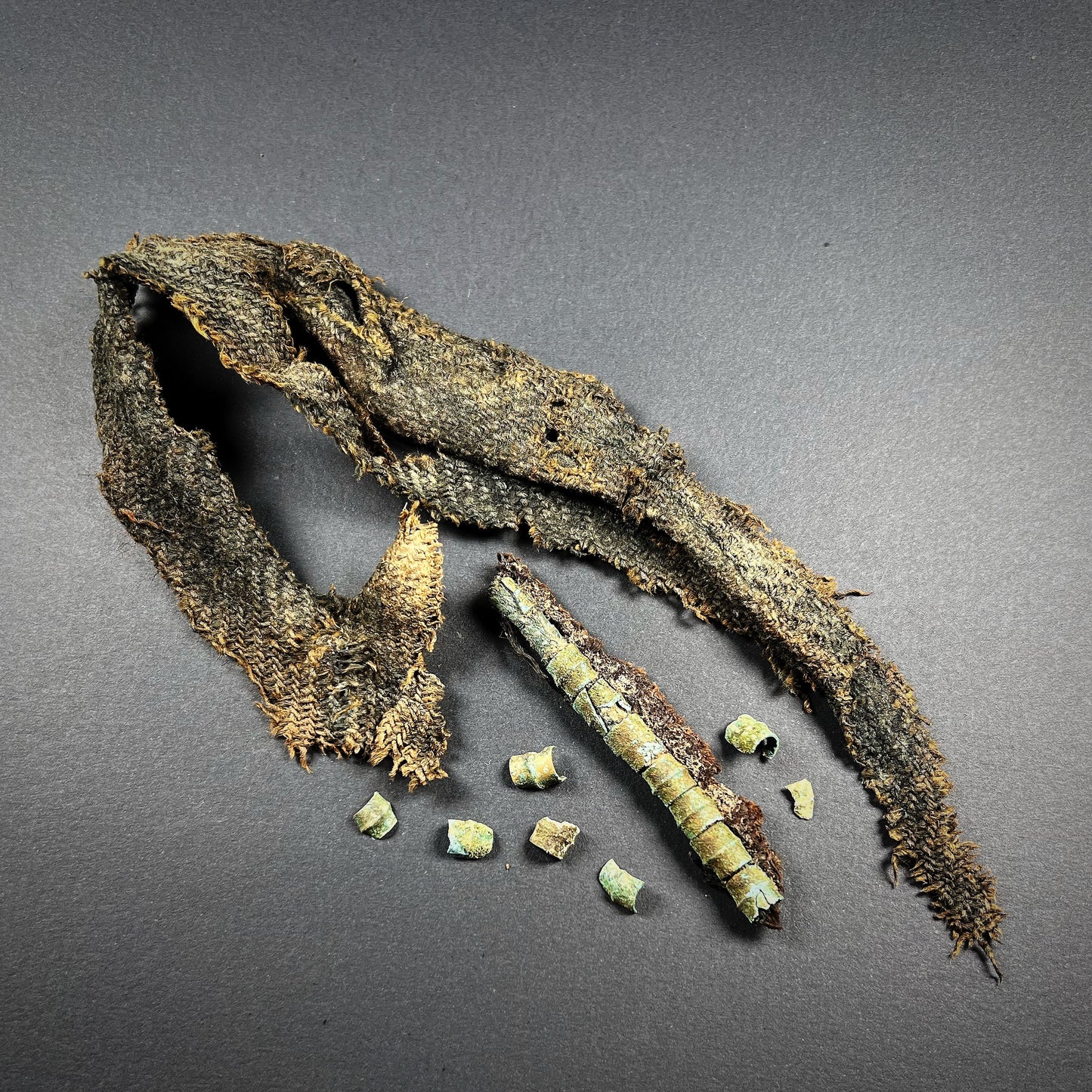 Viking Age Cloth Fragments with Bronze Ring Adornments