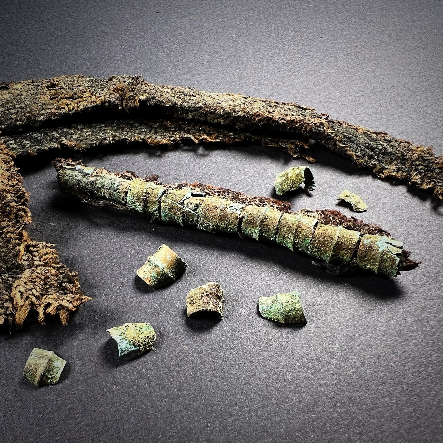 Viking Age Cloth Fragments with Bronze Ring Adornments