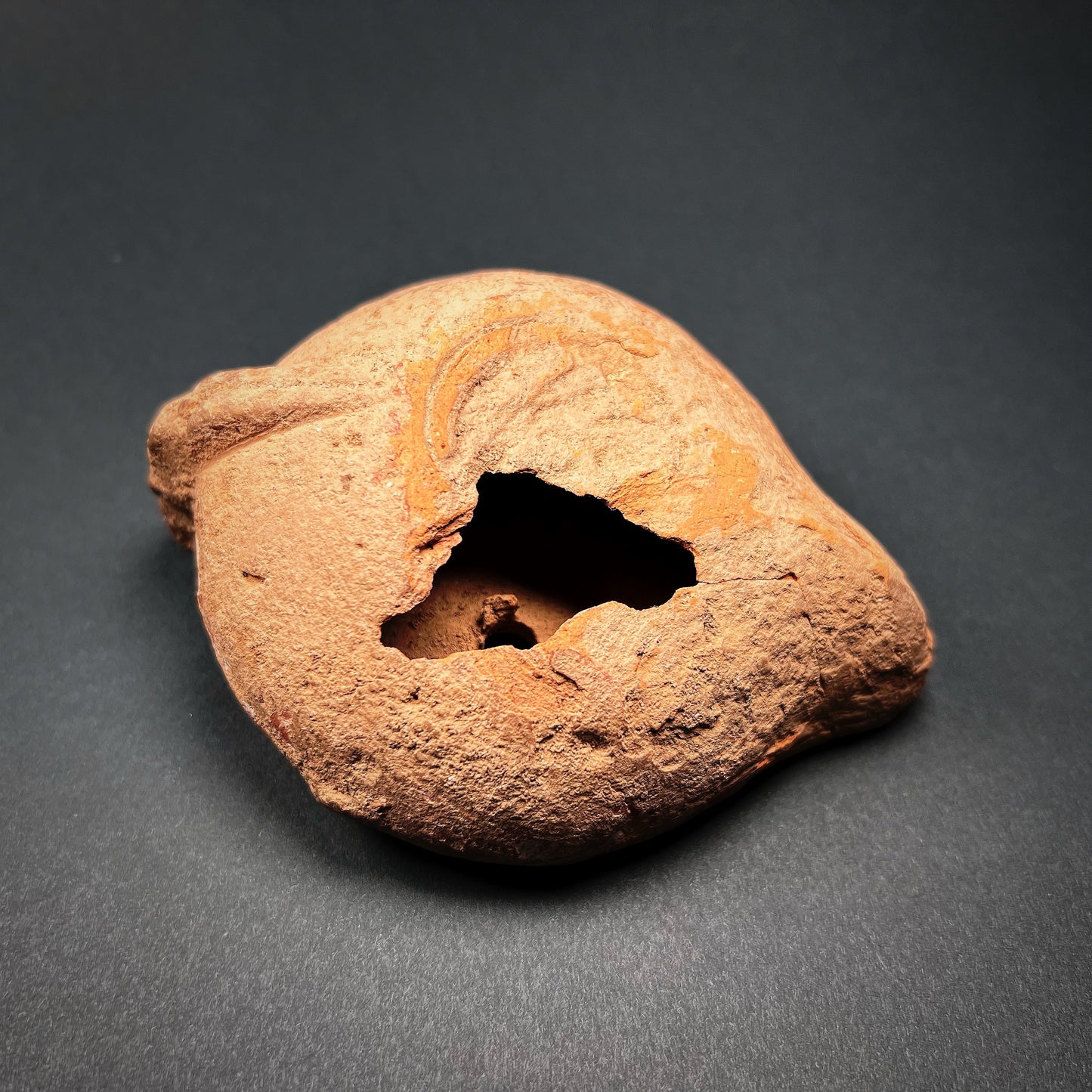 Roman Terracotta Oil Lamp with Dancing Satyr or Cupid