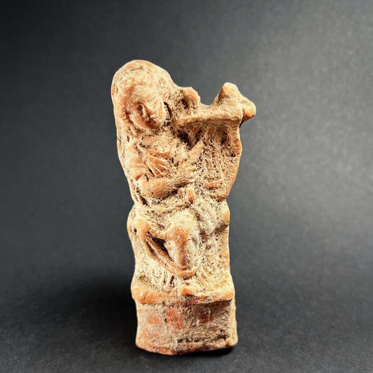Tanagra Terracotta Figurine of a Young Eros