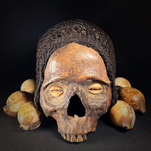 Iban Dayak Trophy Human Skull with Cowrie Shells