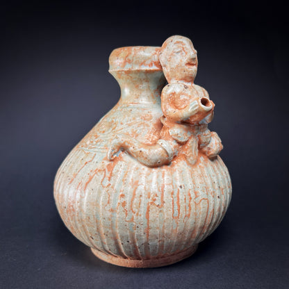 Thai Sawankhalok Celadon Glazed Ritual Ewer with Human Figure (Kendi)