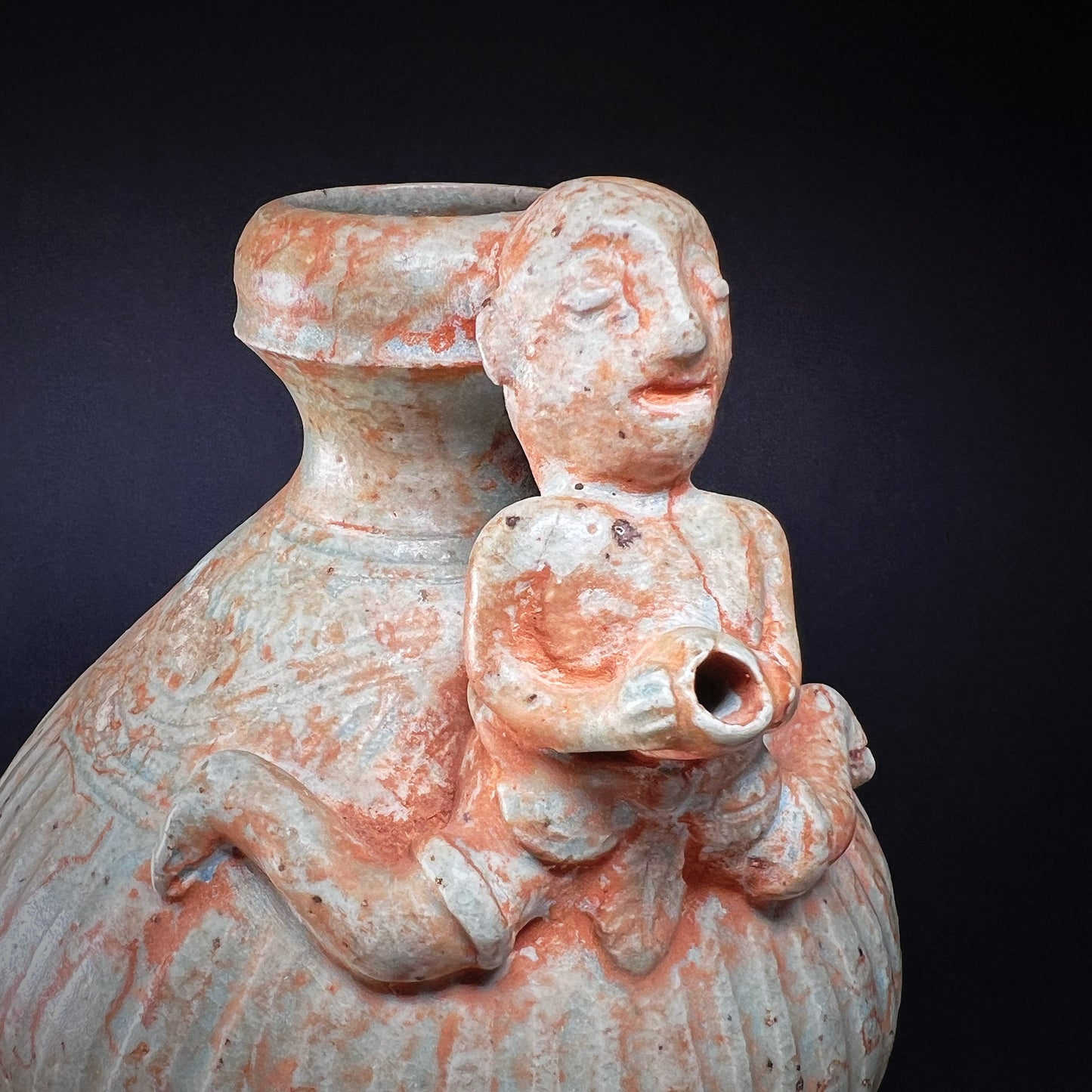 Thai Sawankhalok Celadon Glazed Ritual Ewer with Human Figure (Kendi)