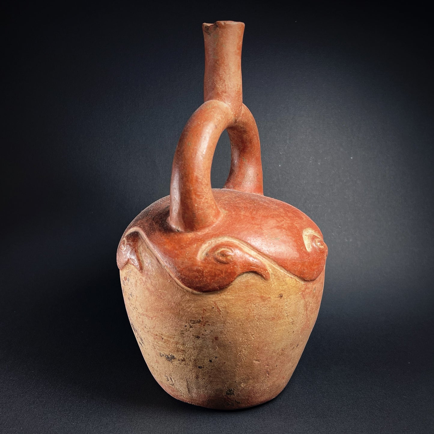 Moche Pottery Stirrup Spout Bottle with Raised Bird Decoration