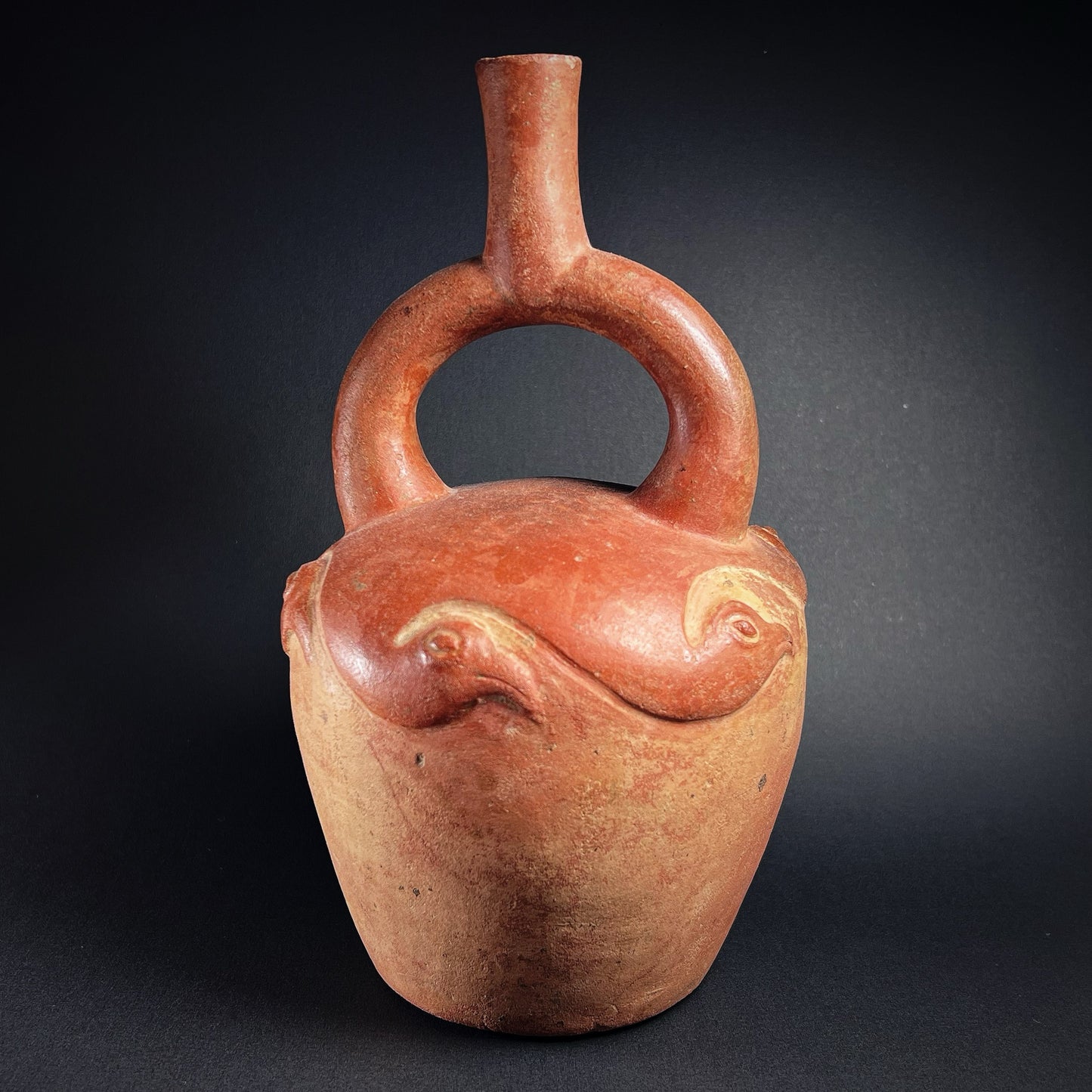 Moche Pottery Stirrup Spout Bottle with Raised Bird Decoration