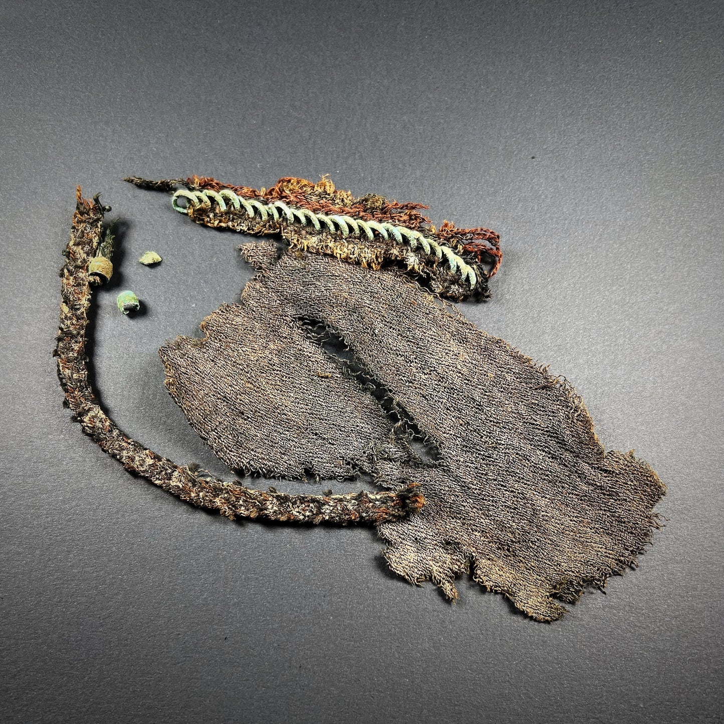 Viking Age Cloth Fragments Decorated with Bronze Rings