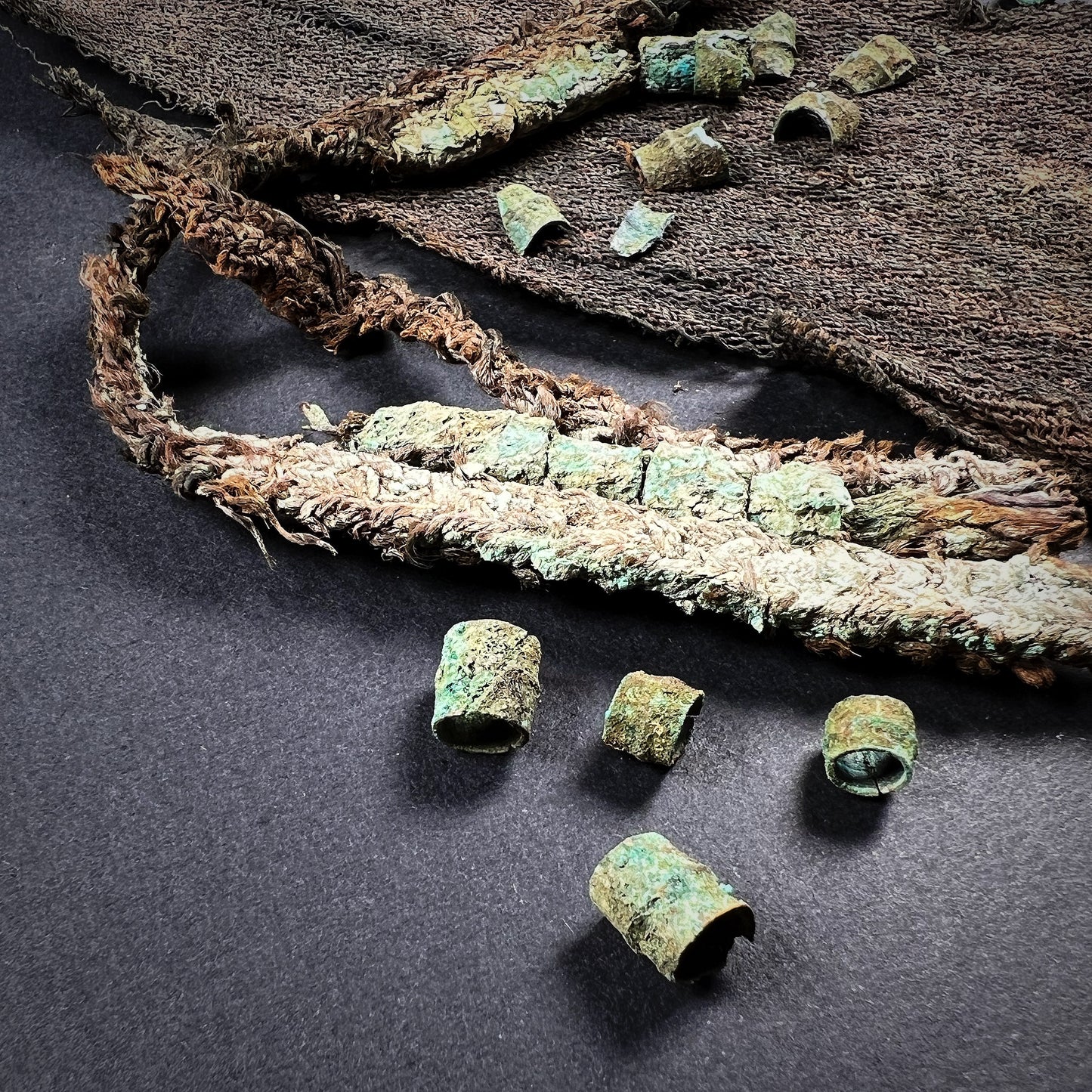 Viking Age Cloth Fragments with Bronze Ring Adornments