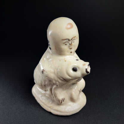 Song Dynasty Cizhou Ware Figure of a Seated Boy and Carp