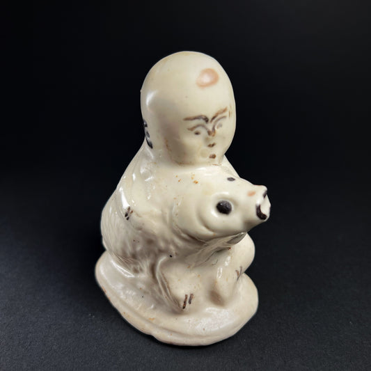 Song Dynasty Cizhou Ware Figure of a Seated Boy and Carp