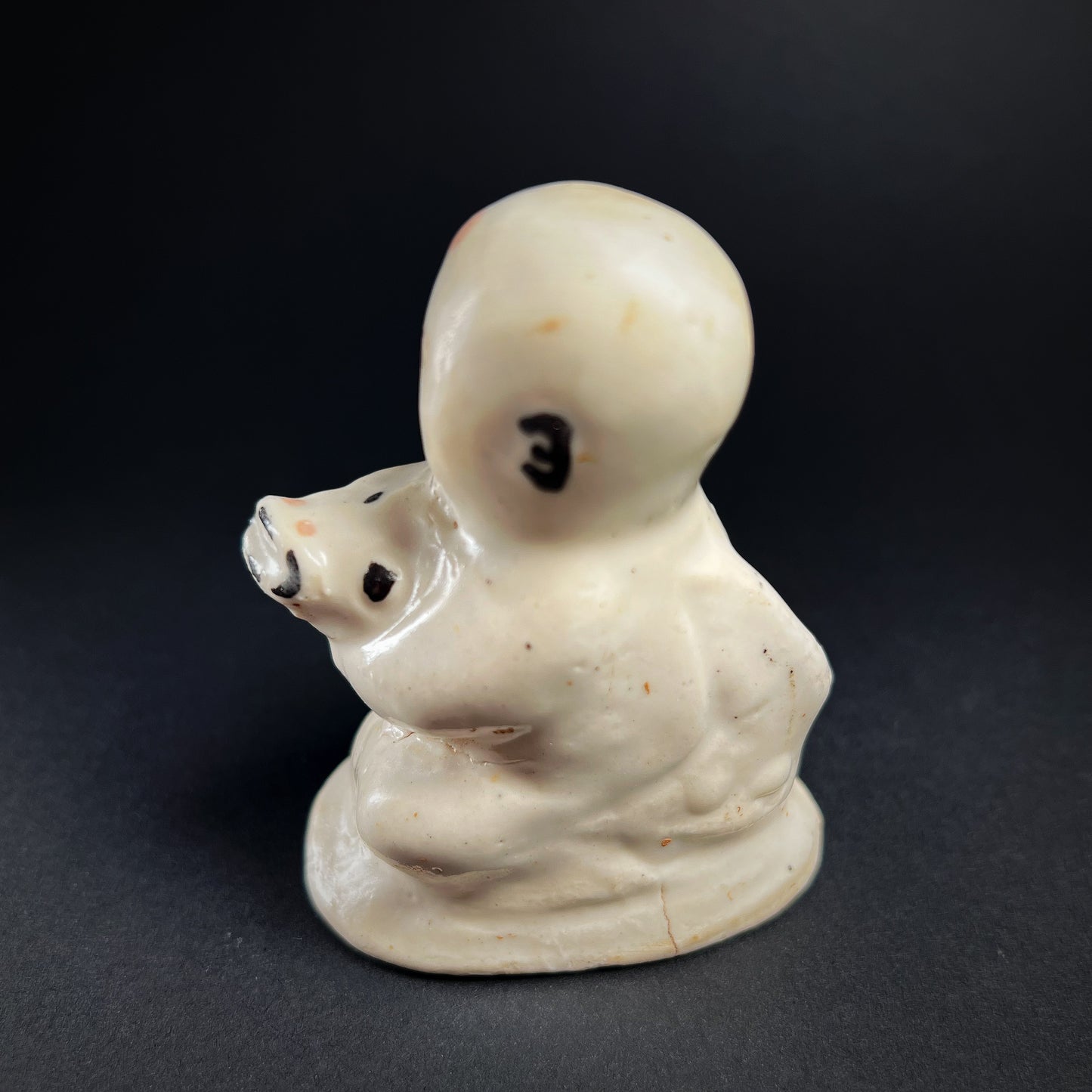 Song Dynasty Cizhou Ware Figure of a Seated Boy and Carp