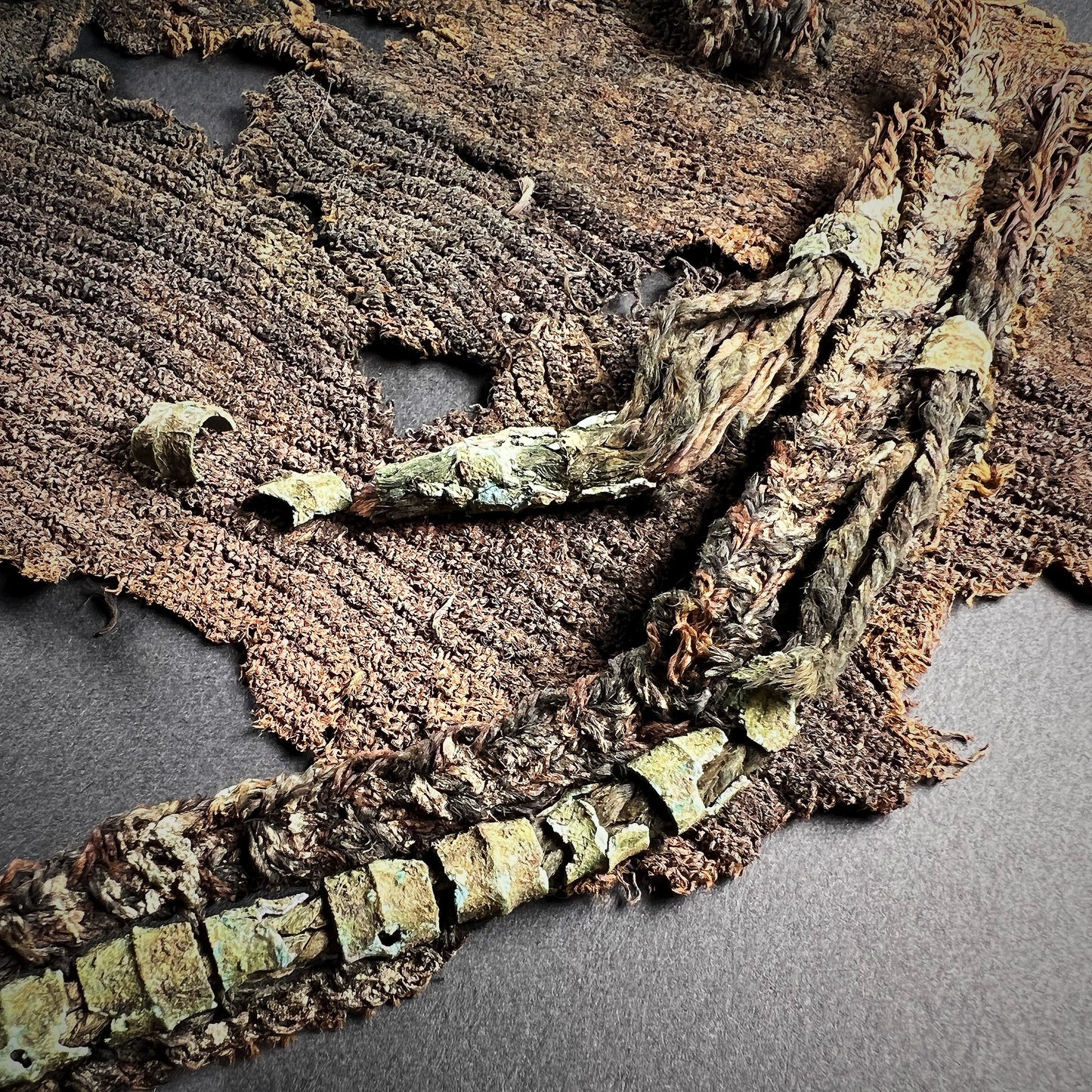 Viking Age Cloth Fragments with Bronze Ring Adornments