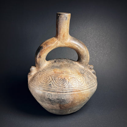 Chimú Blackware Stirrup Spout Vessel with Incised Spiral Motif