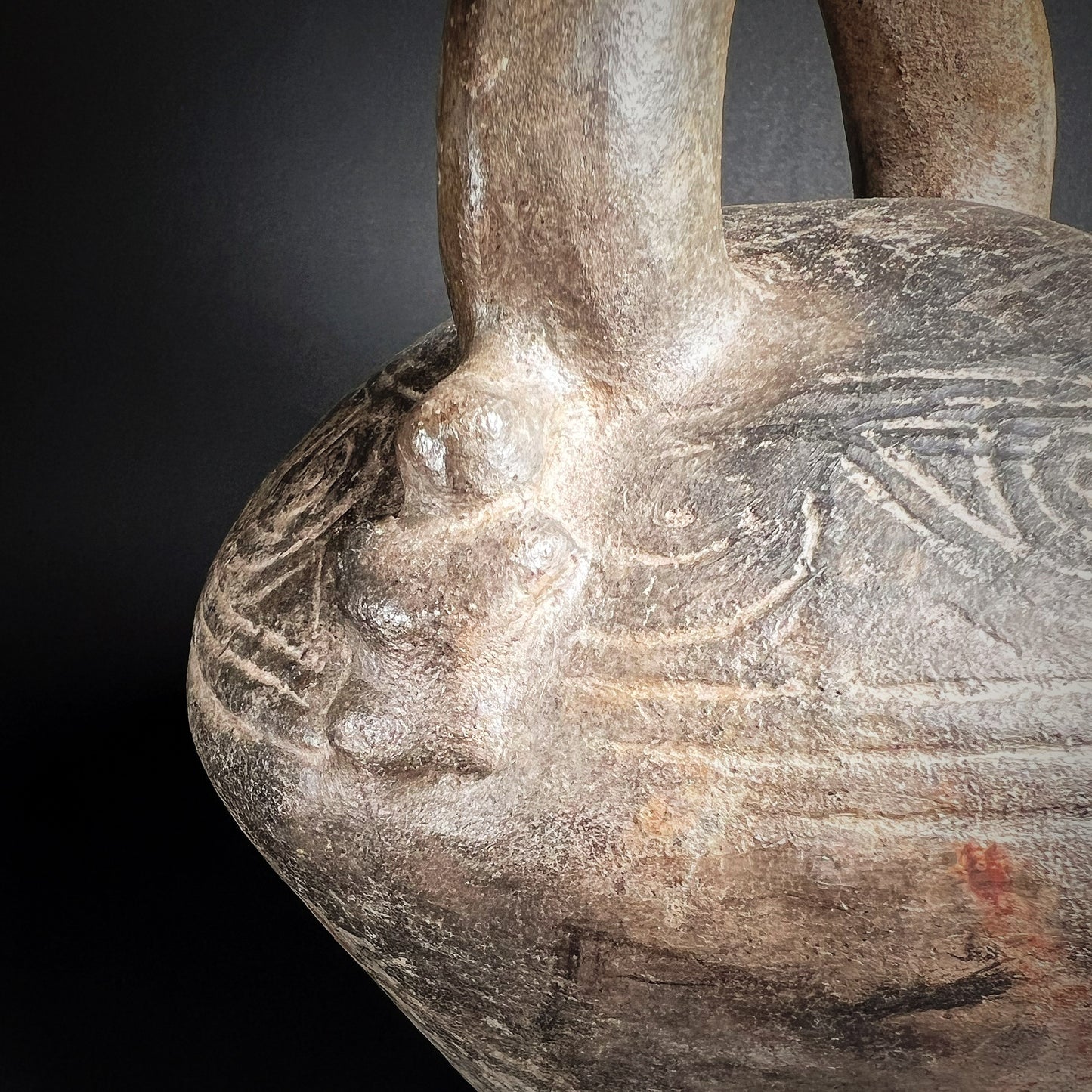 Chimú Blackware Stirrup Spout Vessel with Incised Spiral Motif