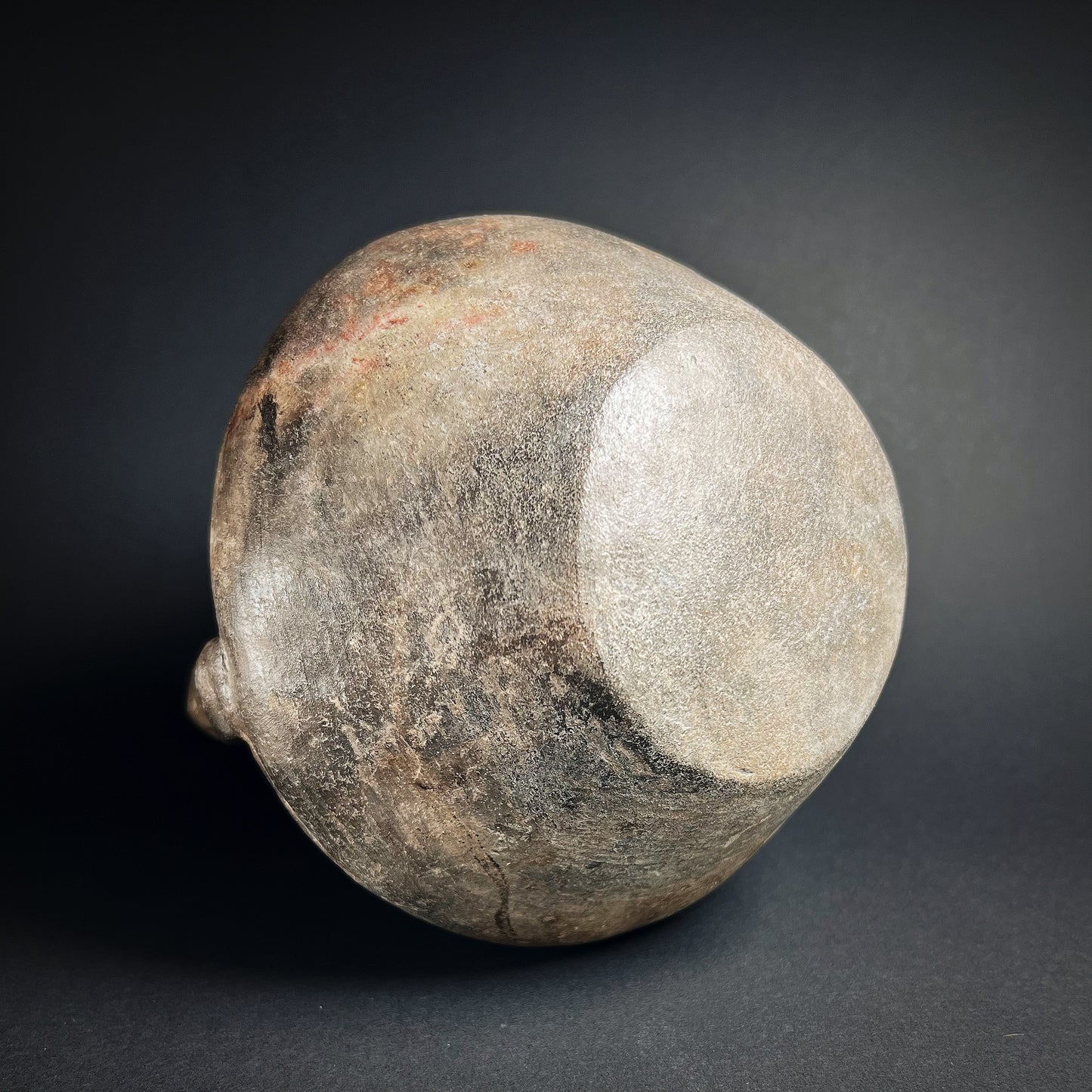 Chimú Blackware Stirrup Spout Vessel with Incised Spiral Motif